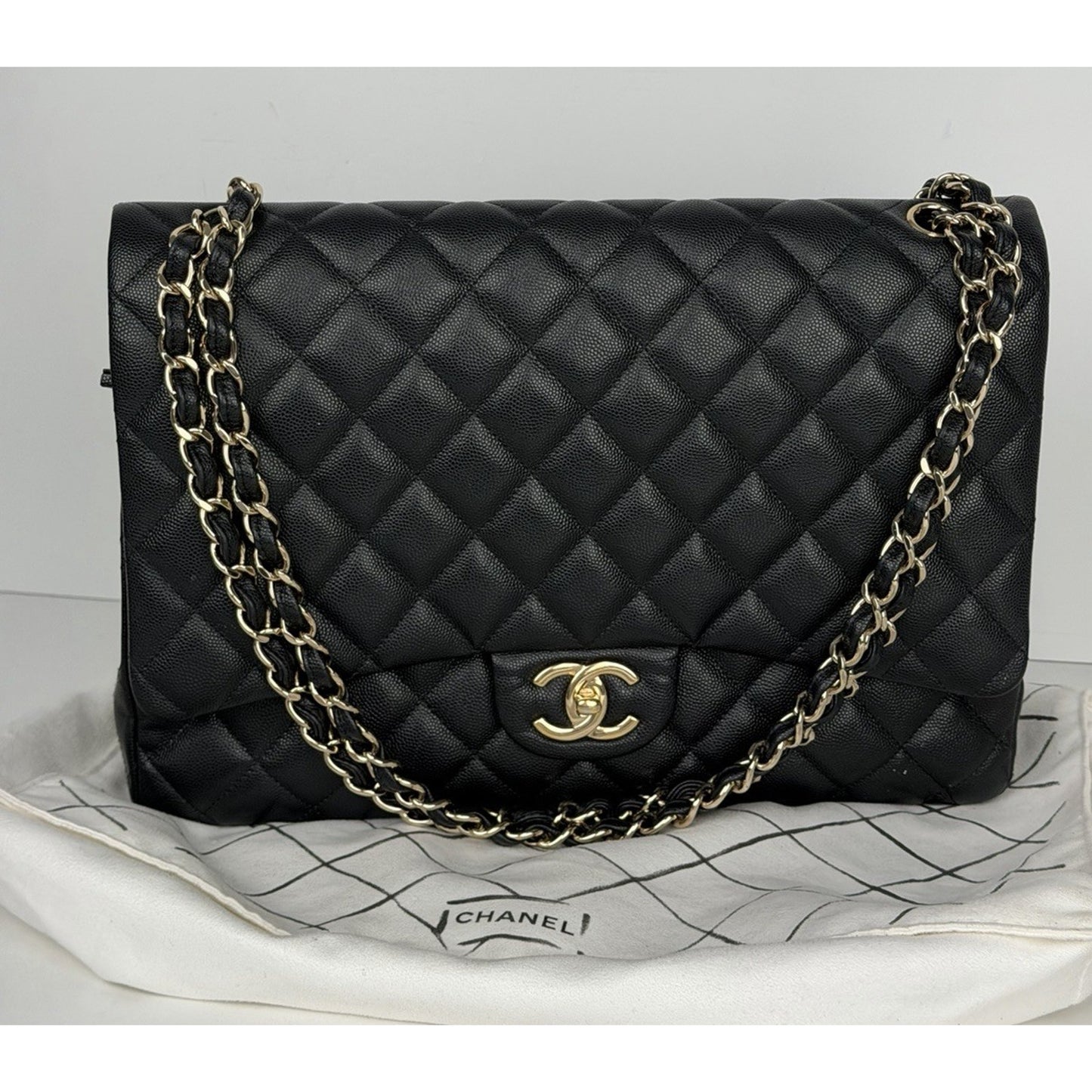 Chanel Classic Maxi Double Flap Bag in Black Caviar Quilted Leather NFC E4