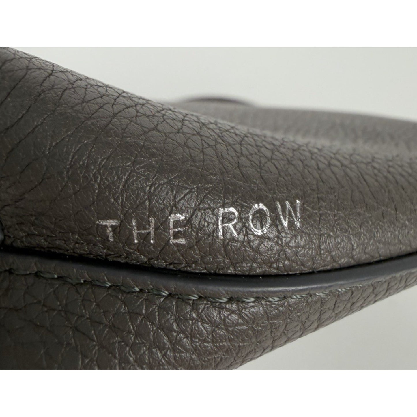 The Row Agnes Pebbled Leather Medium Zip Clutch in Grey S04