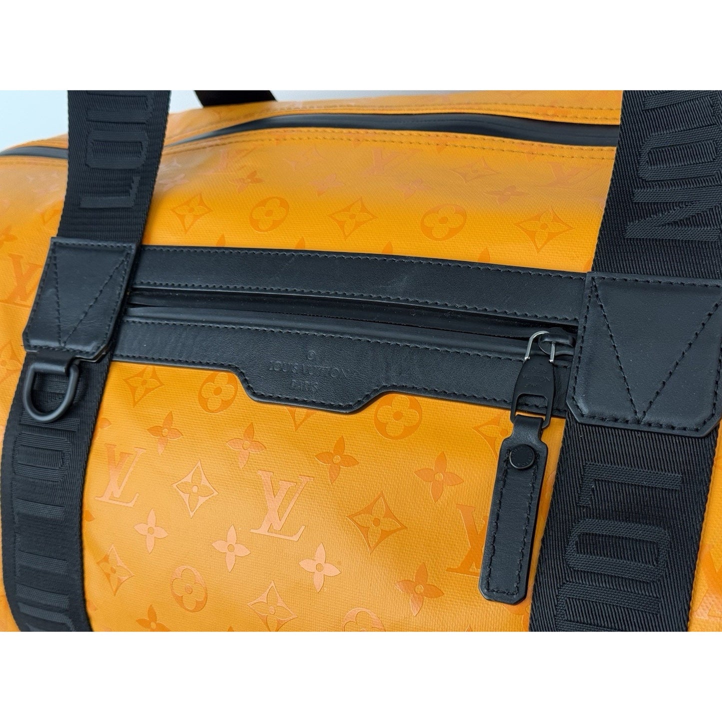 Louis Vuitton Ski Monogram Storm Coated Orange Canvas Keepall Sport