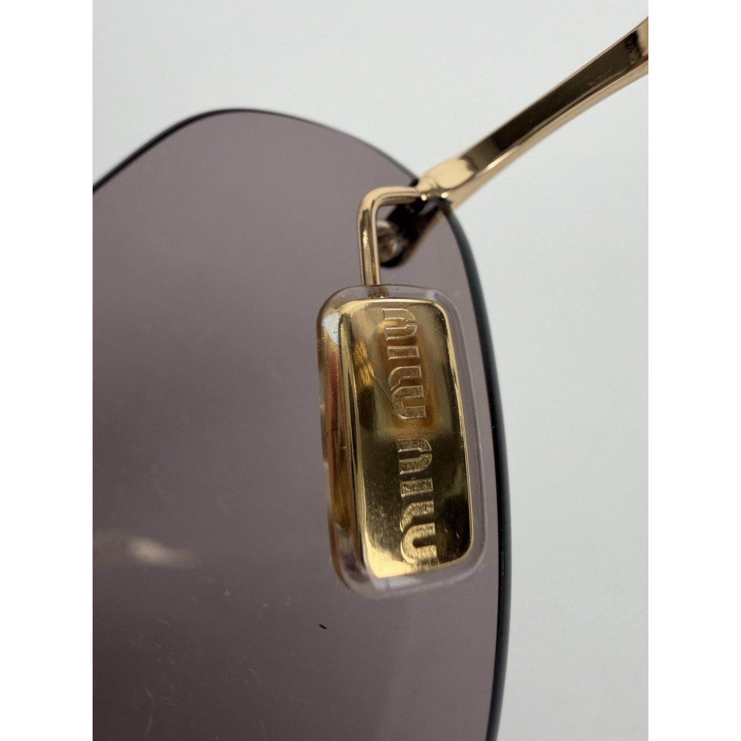 Miu Miu Aube MU 54YS Sunglasses in Gold-Tone Frame & Mauve Lenses S