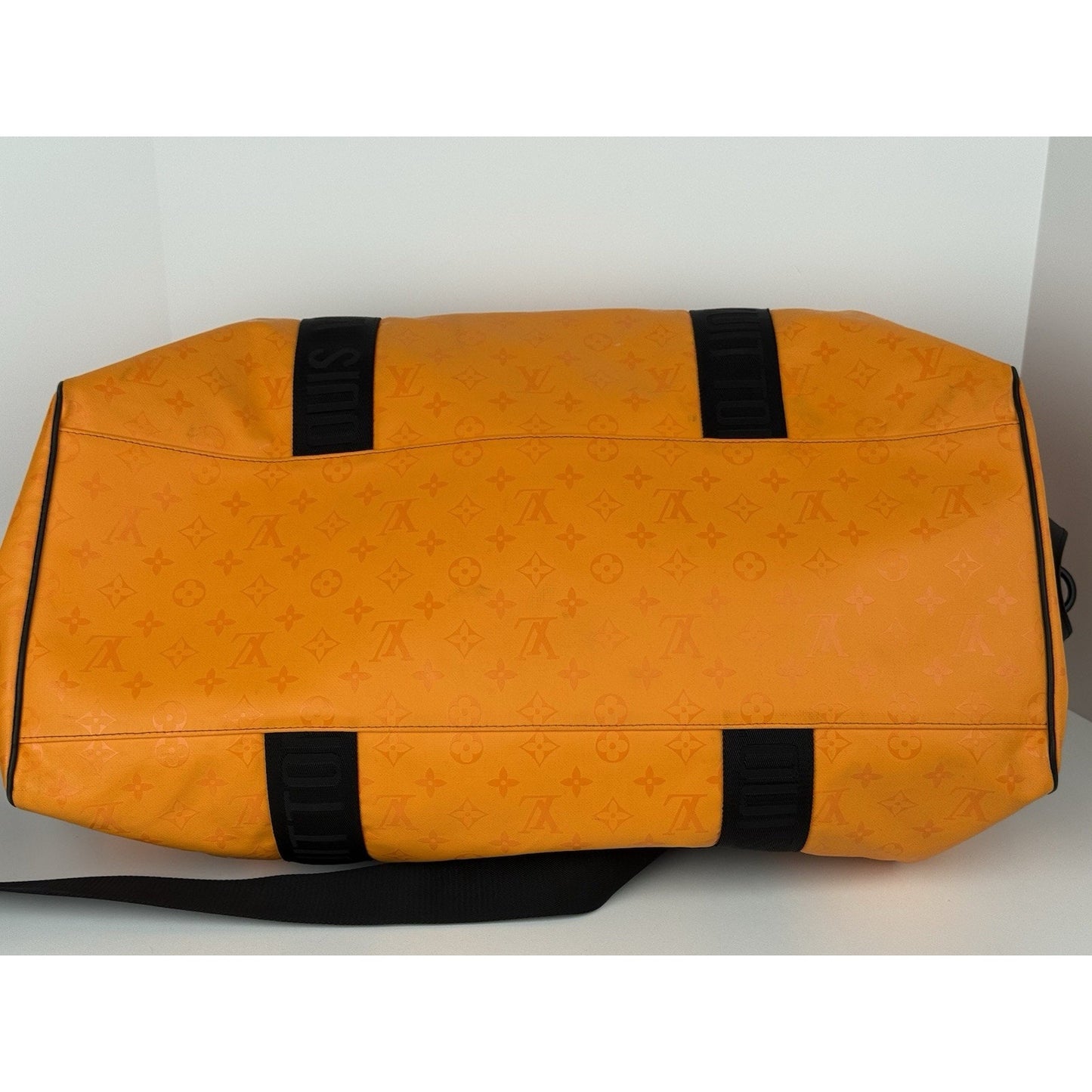 Louis Vuitton Ski Monogram Storm Coated Orange Canvas Keepall Sport