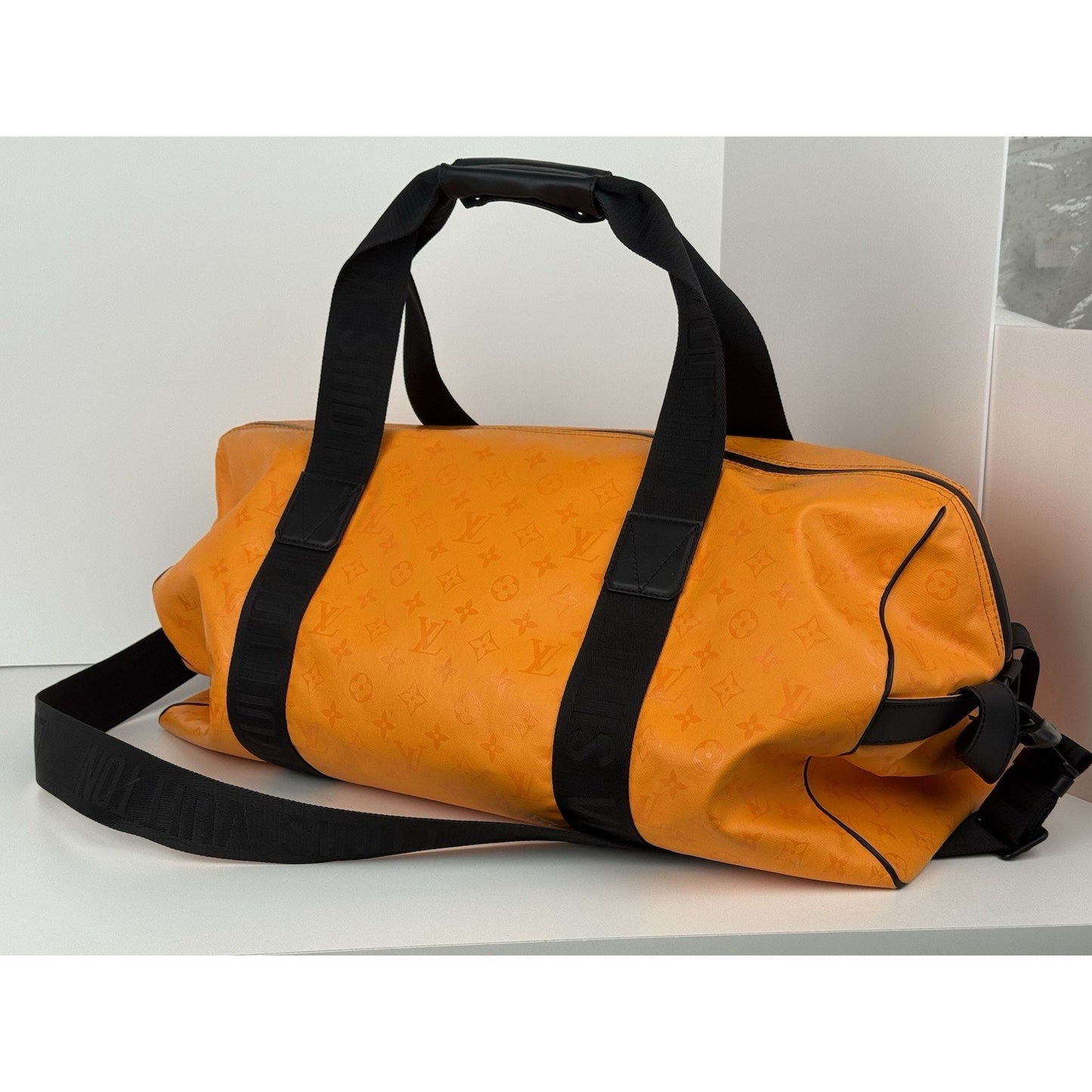 Louis Vuitton Ski Monogram Storm Coated Orange Canvas Keepall Sport