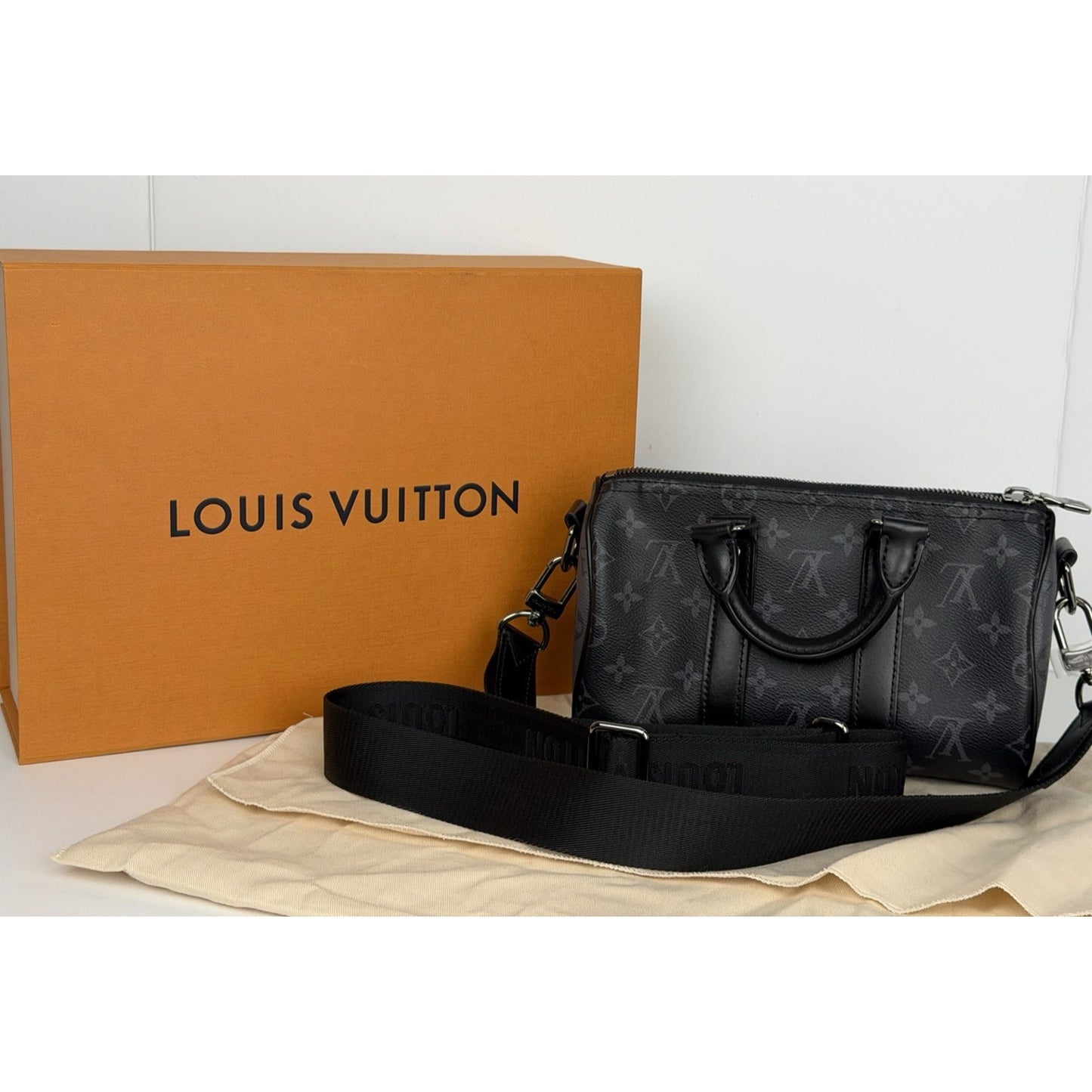 Louis Vuitton Keepall Bandouliere 25 Reverse Monogram Eclipse Canvas Microchipped