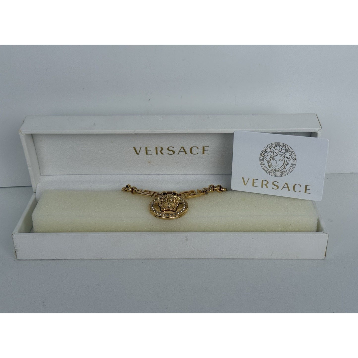 Versace Gold-Tone & Crystal Medusa Pendant Necklace
