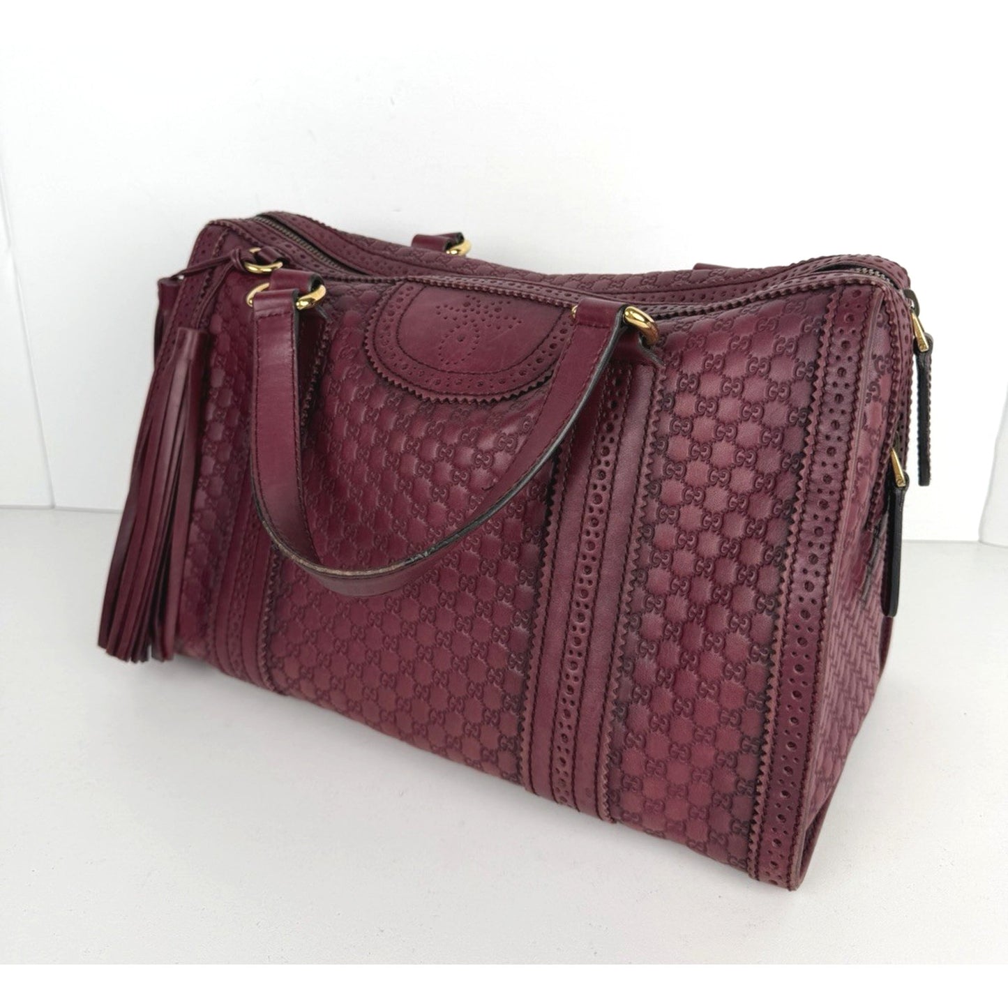 Gucci Duilio Brogue Boston Bag in Burgundy Microguccissima Embossed Leather S-16