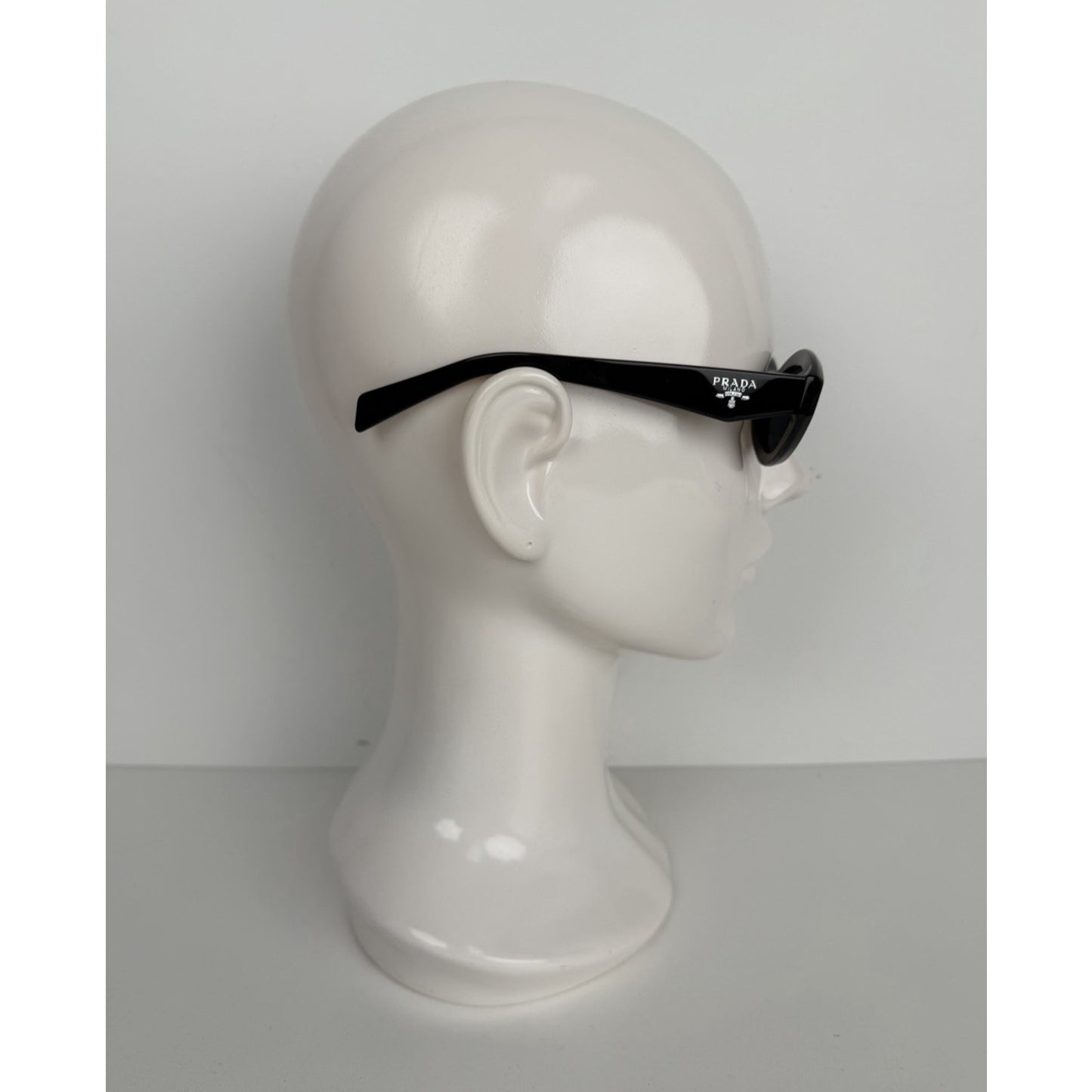 Prada Symbole Oval Car-Eye Sunglasses 55 in Black with Dark Gray Lenses