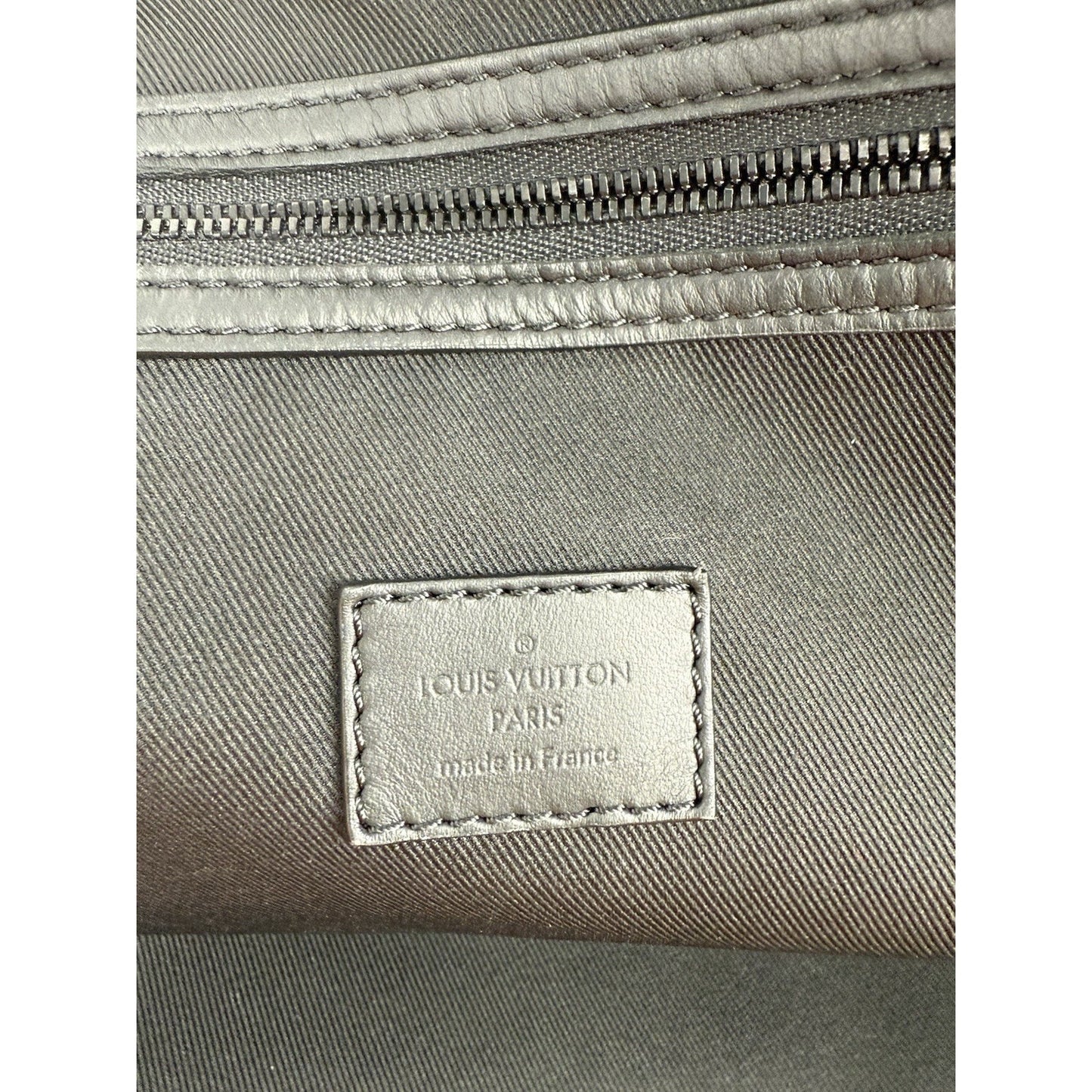 Louis Vuitton Ski Monogram Storm Coated Orange Canvas Keepall Sport