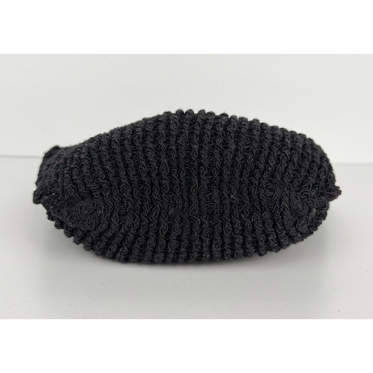 The Row Flat Micro Circle Bag in Black S08
