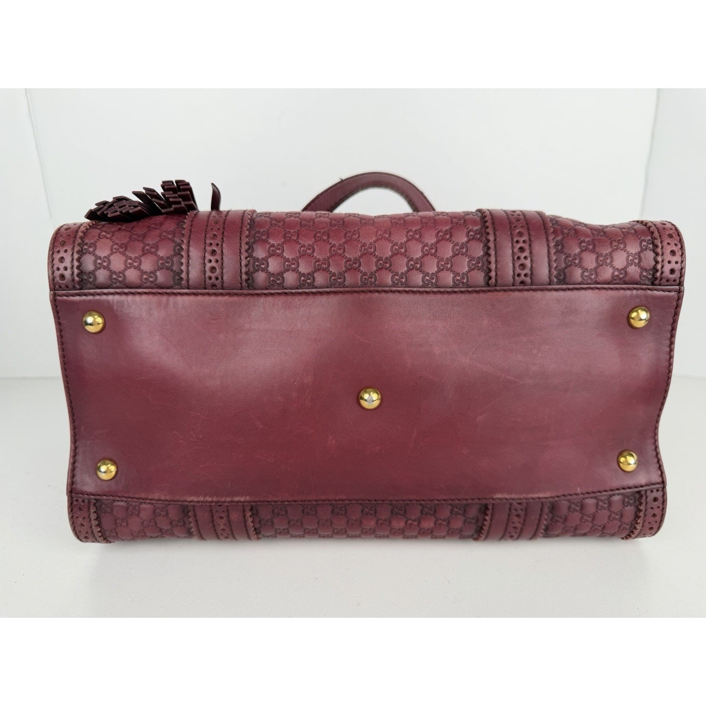 Gucci Duilio Brogue Boston Bag in Burgundy Microguccissima Embossed Leather S-16