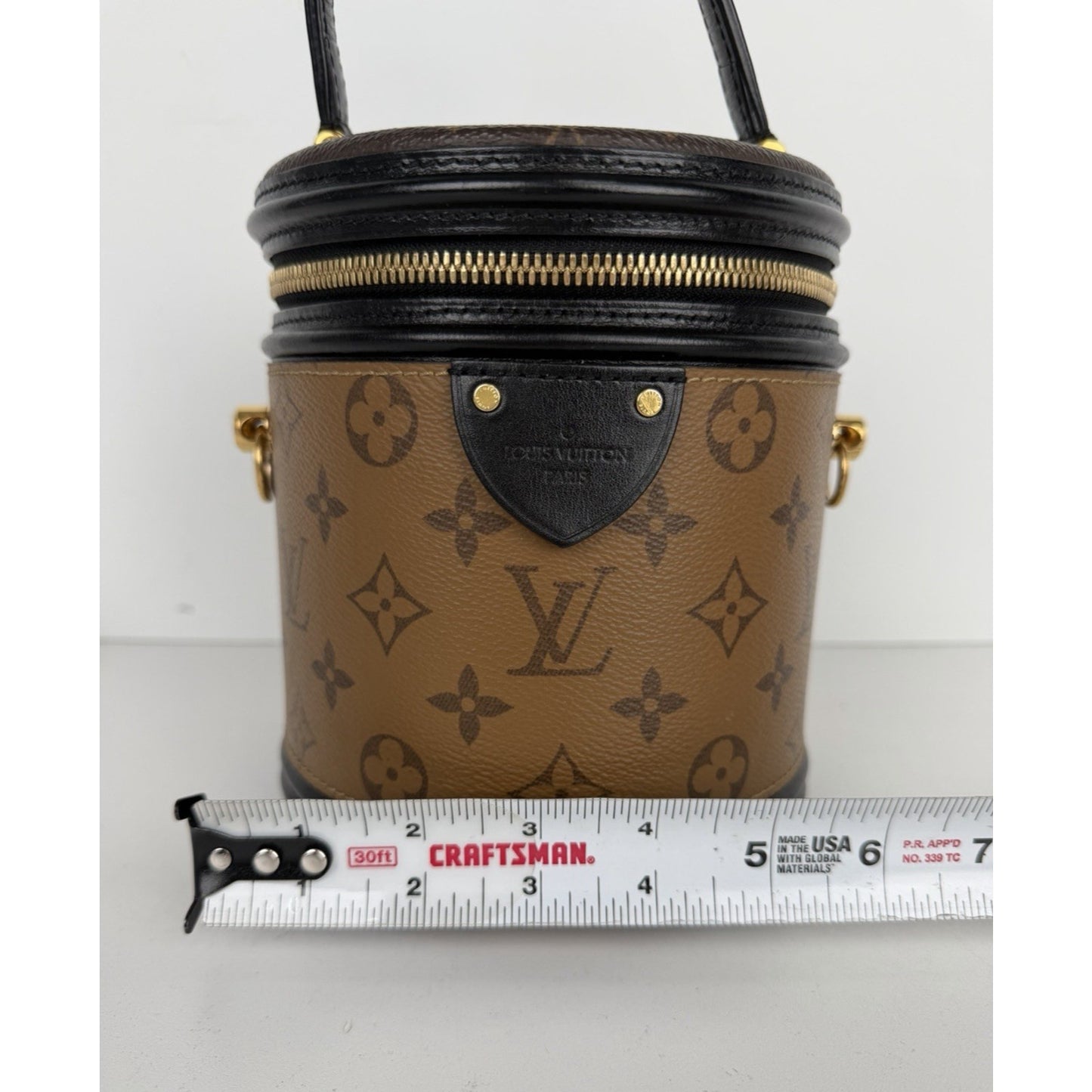Louis Vuitton Cannes Handbag in Brown LV Reverse Monogram Coated Canvas NFC B-6