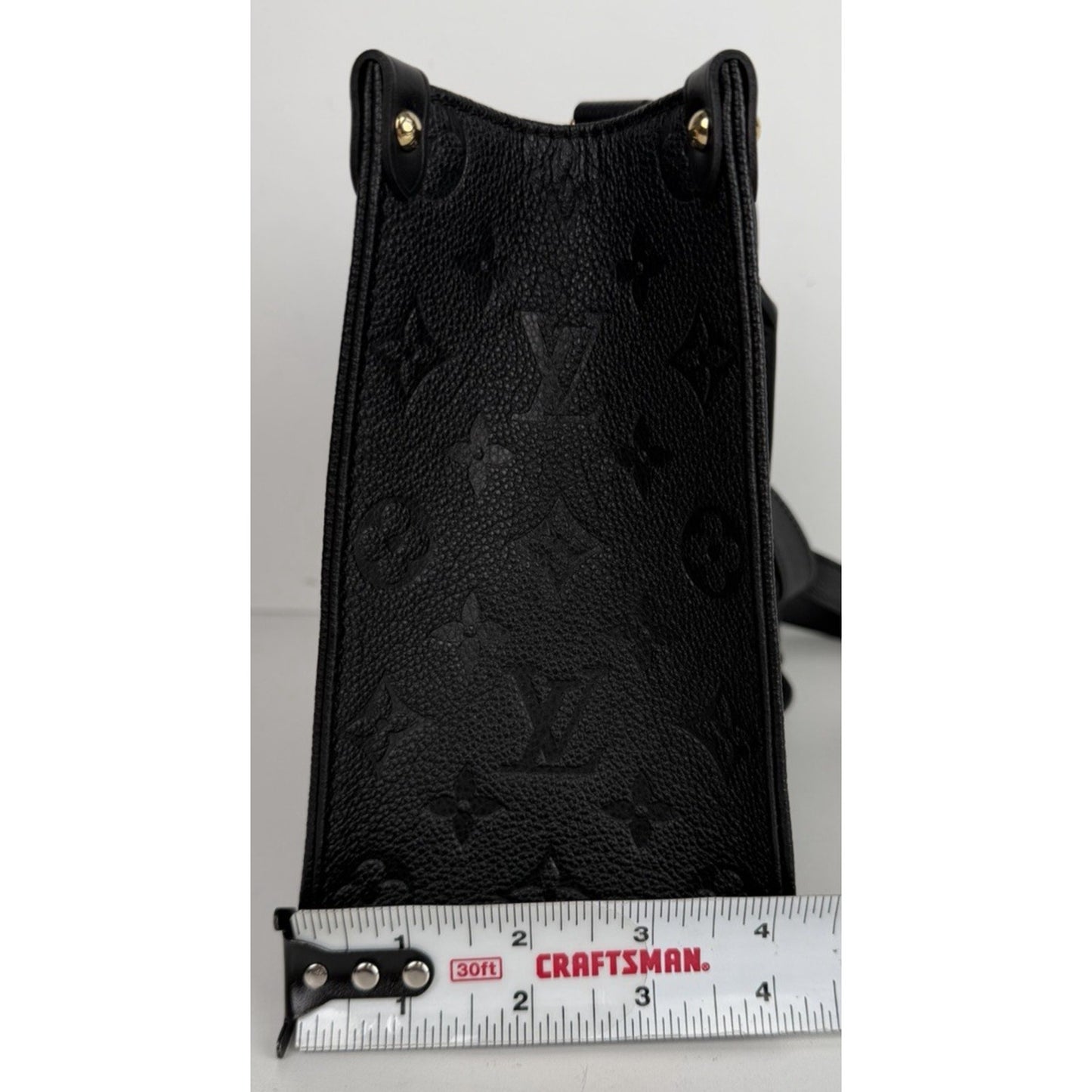 Louis Vuitton OnTheGo PM Bag in Black Embossed Monogram Empreinte Leather NFC E1