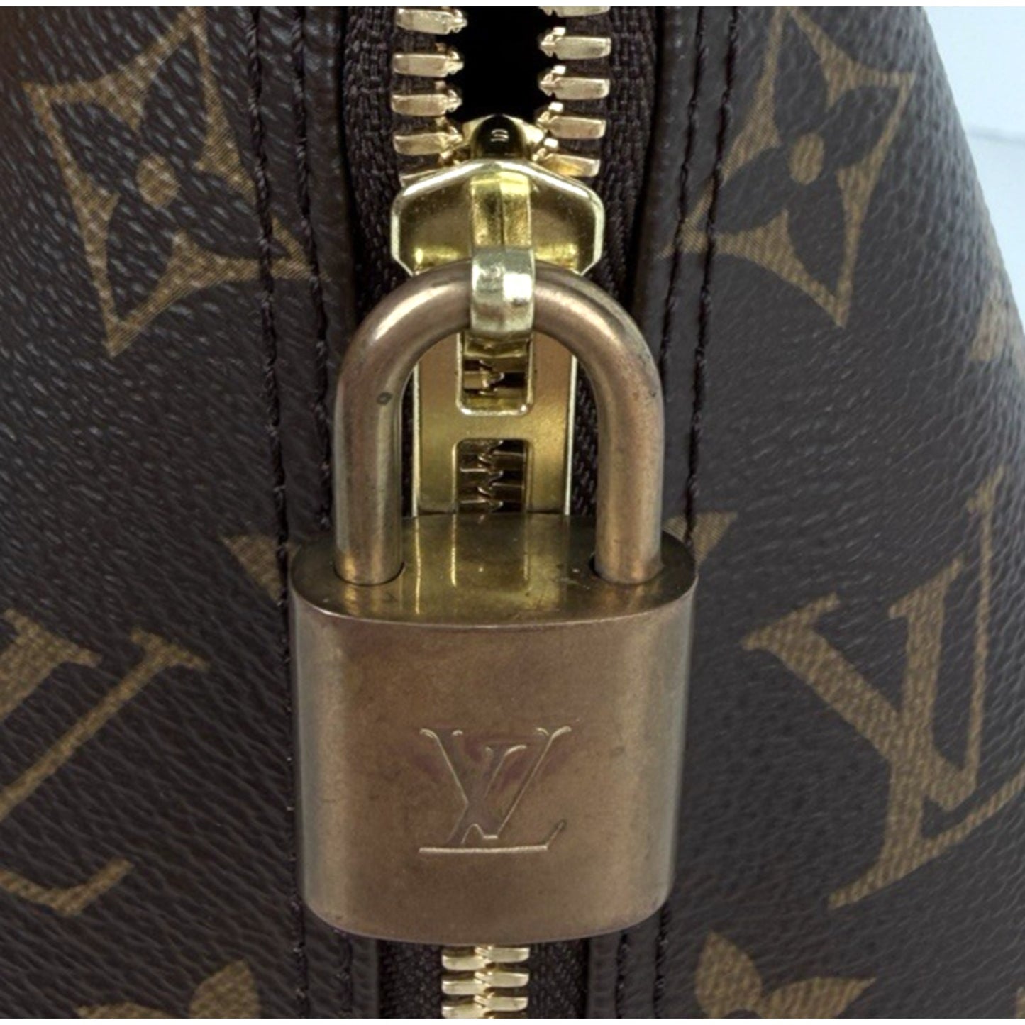 Louis Vuitton Alma PM Bag in Brown Coated Canvas with Leather Trim NFC S