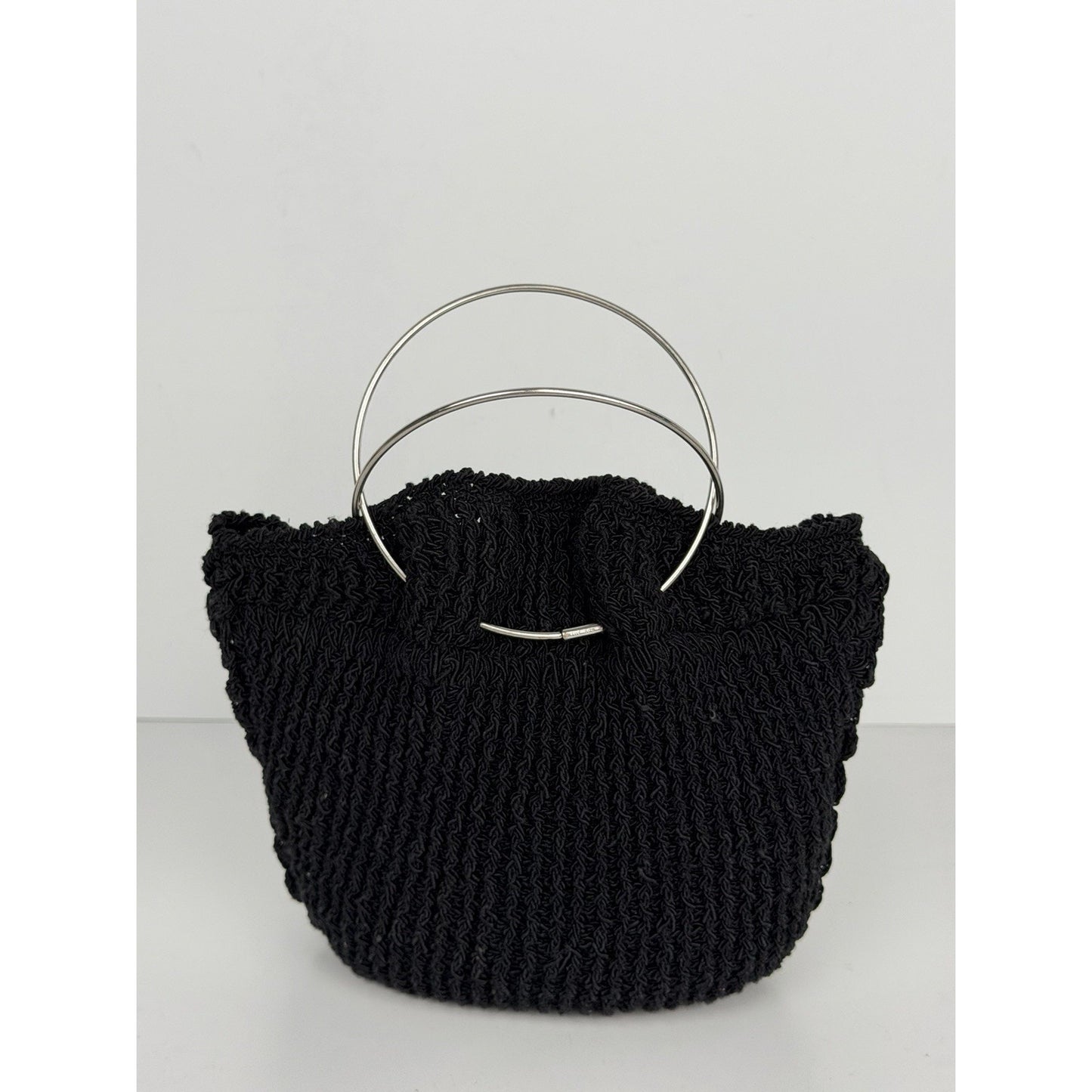 The Row Flat Micro Circle Bag in Black S08