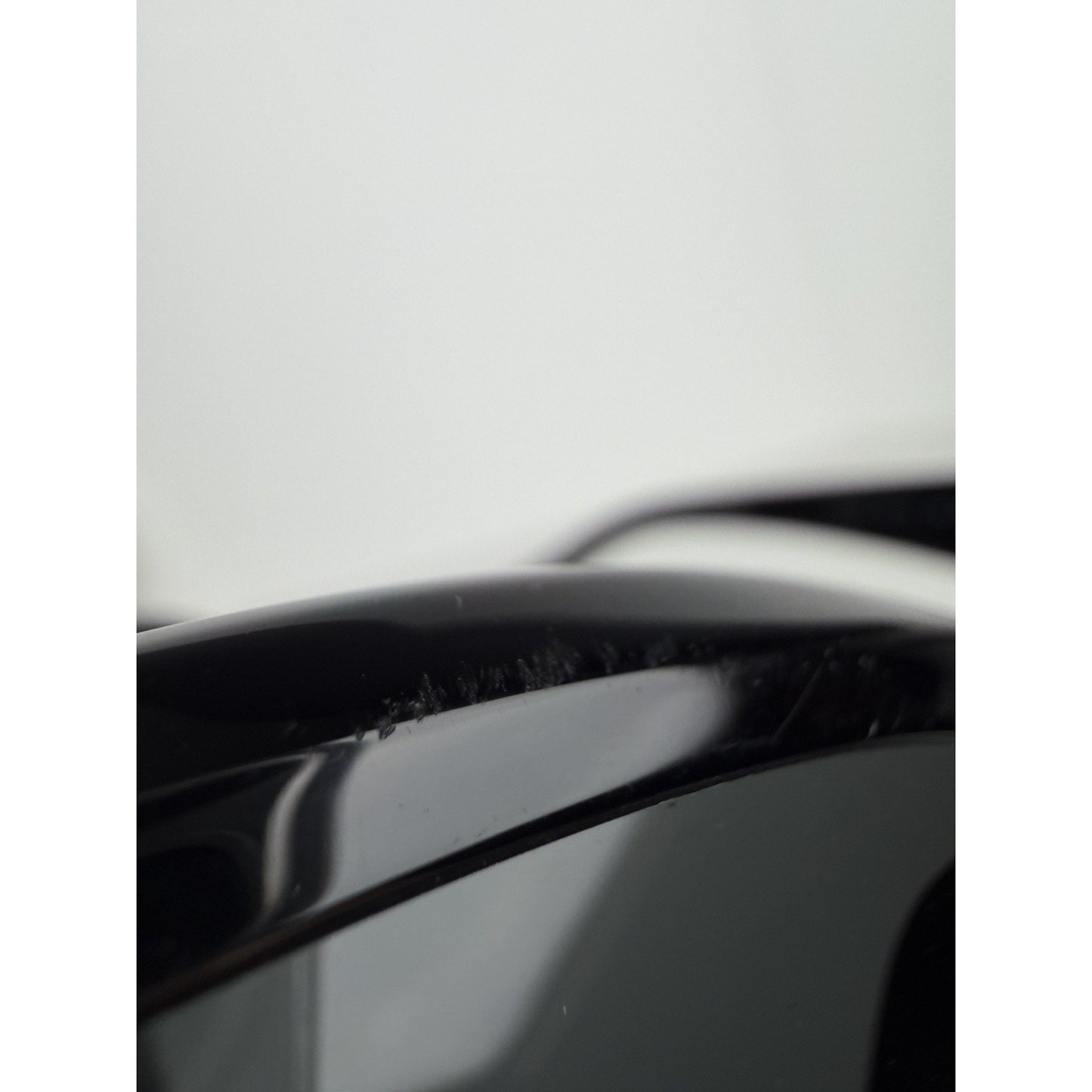 Prada Symbole Oval Car-Eye Sunglasses 55 in Black with Dark Gray Lenses