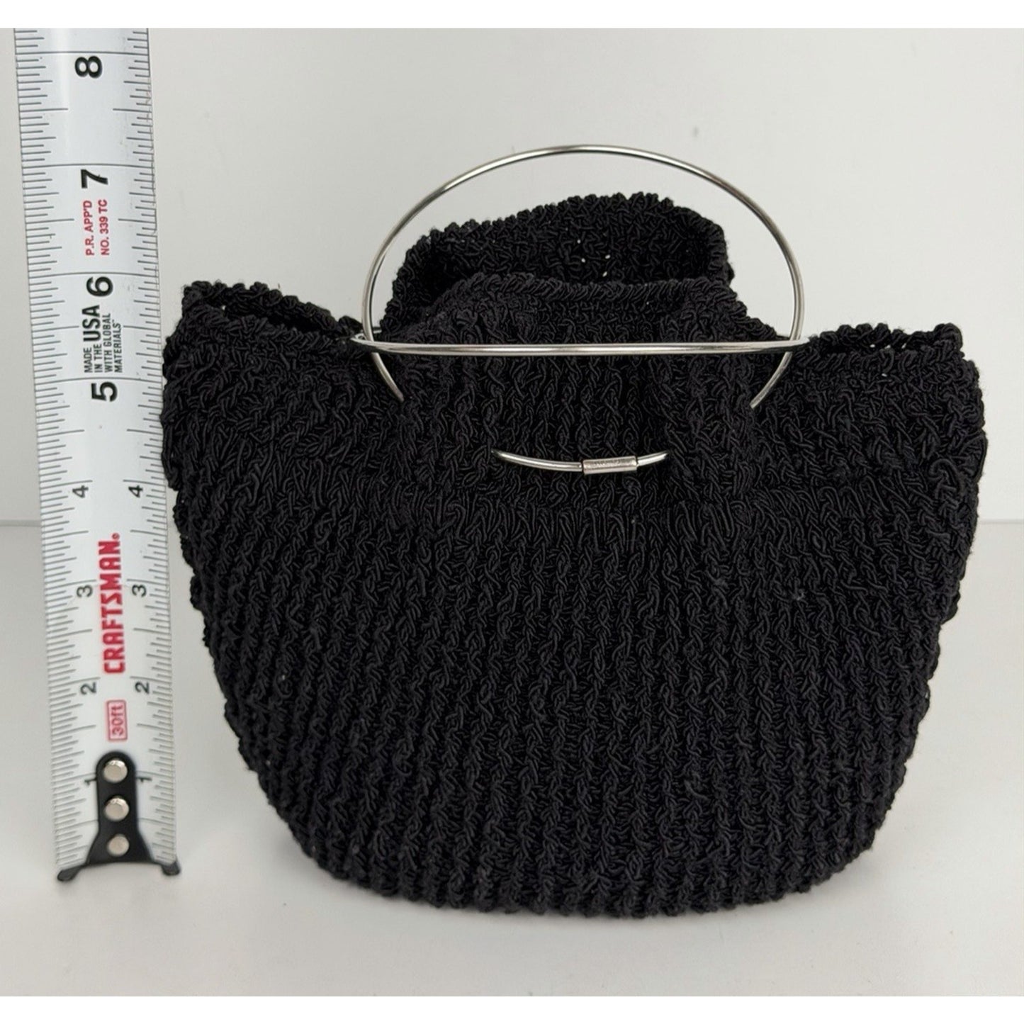 The Row Flat Micro Circle Bag in Black S08