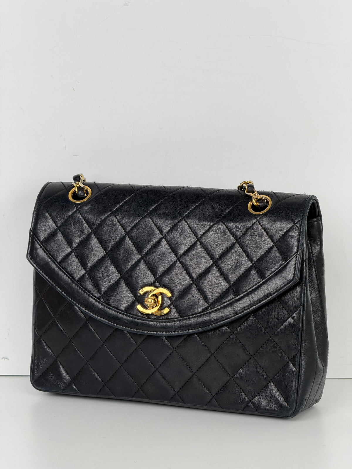 Chanel Curved Flap Shoulder Bag in Black Quilted Lambskin Leather 1994 Vintage