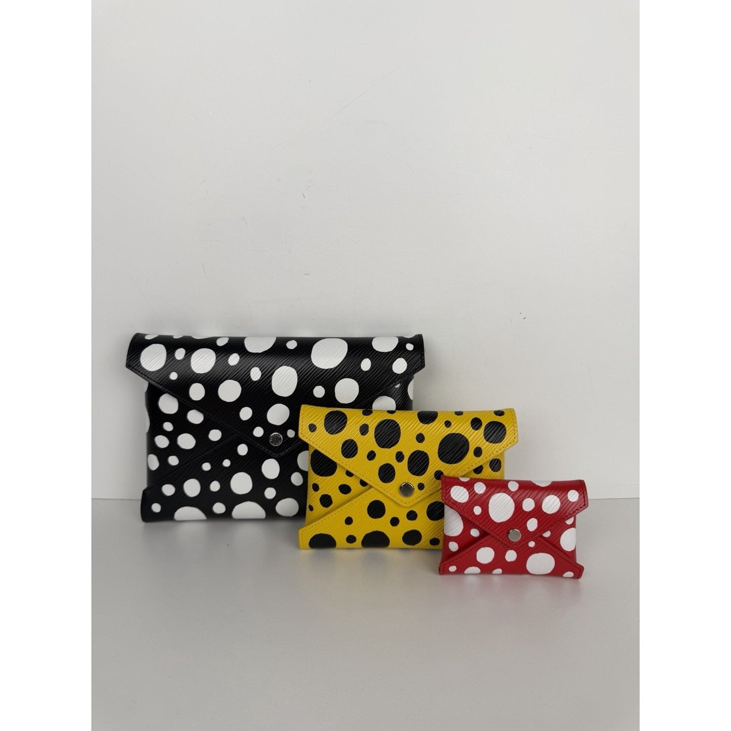 Louis Vuitton x Yayoi Kusama Kirigami Pochette Bag in Polka Dot Epi Leather B1