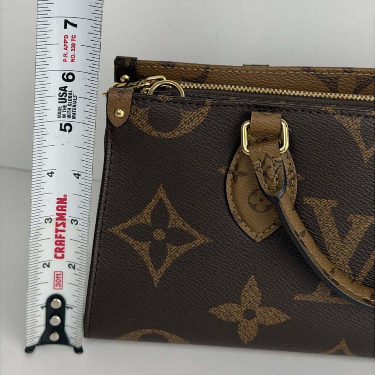 Louis Vuitton OnTheGo East West HandBag Monogram Reverse Brown Canvas NFC E2