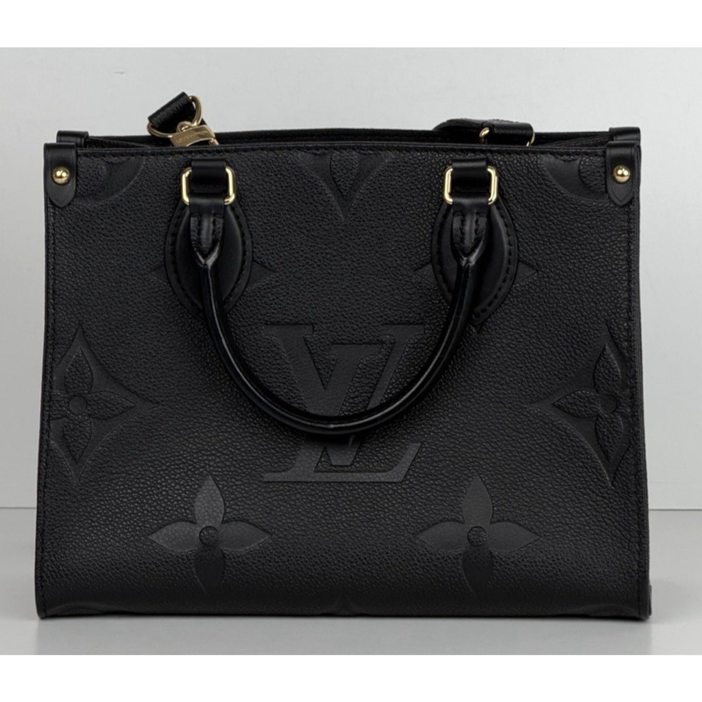 Louis Vuitton OnTheGo PM Bag in Black Embossed Monogram Empreinte Leather NFC E1