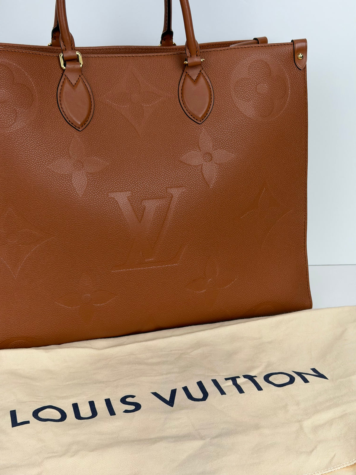 Louis Vuitton Onthego GM Tote Bag in Cognac Giant Monogram Empreinte Leather YC7
