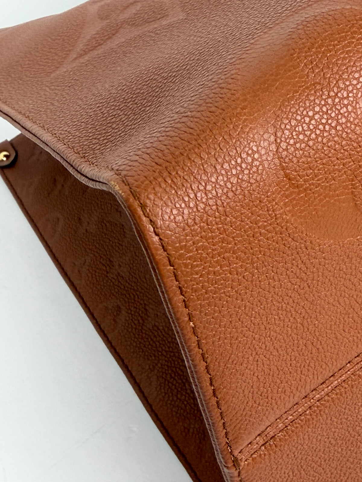 Louis Vuitton Onthego GM Tote Bag in Cognac Giant Monogram Empreinte Leather YC7