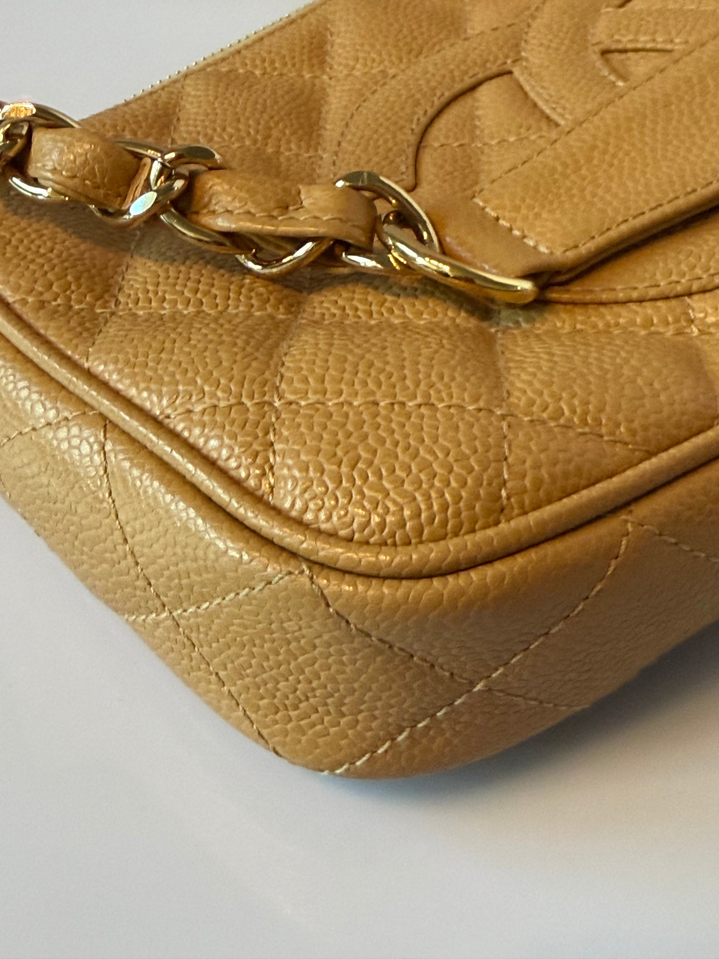 Chanel Timeless CC Pochette Beige Caviar Leather E1