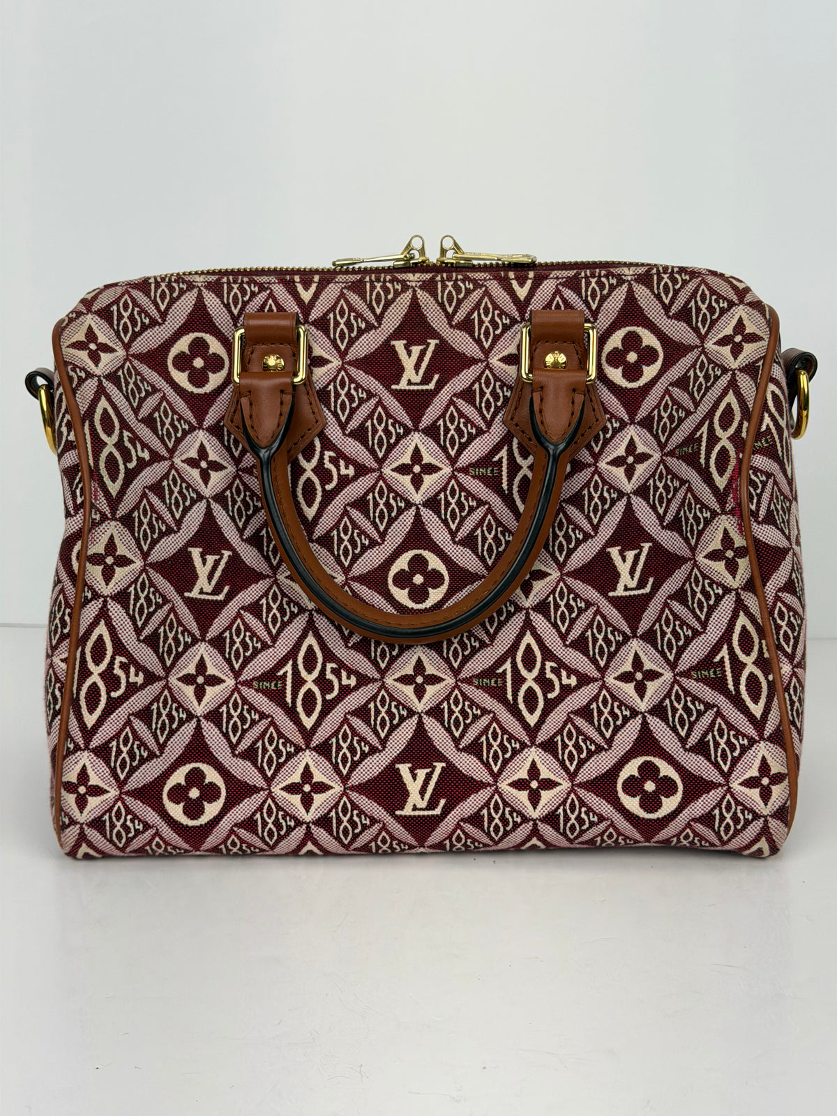Louis Vuitton "Since 1854" Speedy Bandouliere 25 Handbag in Burgundy Monogram Jacquard 2020 YC8