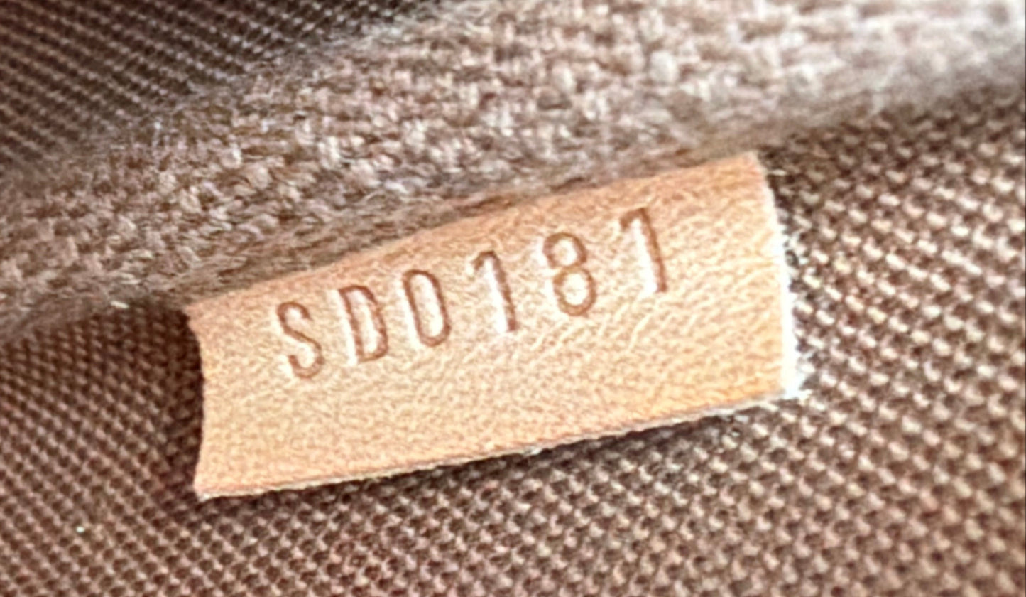 Louis Vuitton Eva Pochette in Brown LV Monogram Coated Canvas 2011 Y-E06
