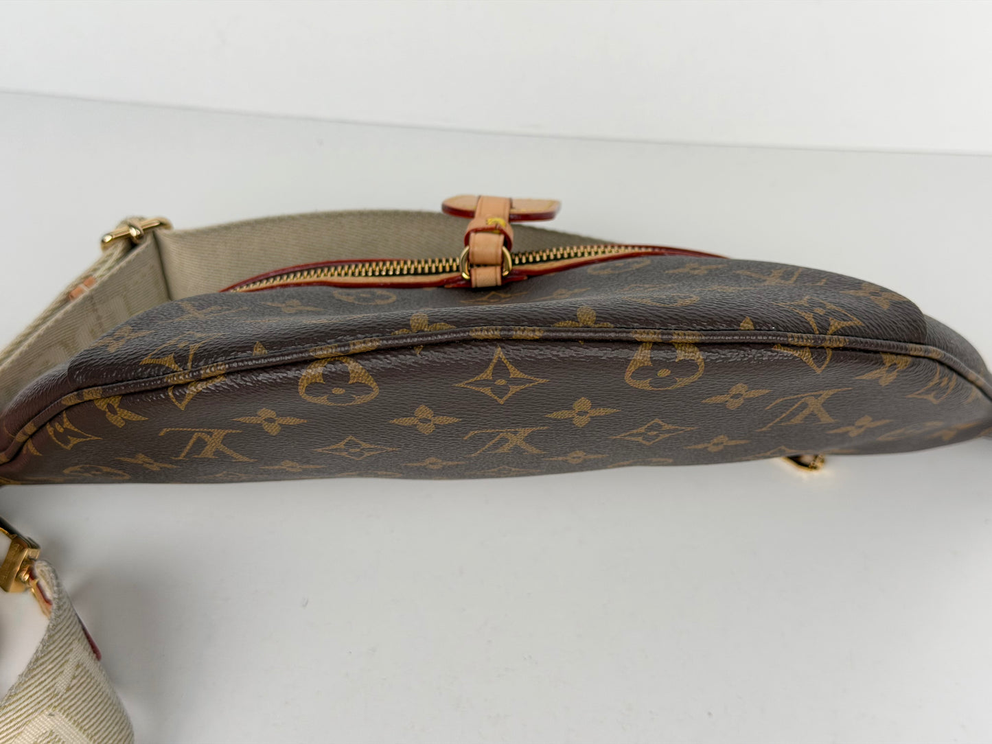 Louis Vuitton High Rise Bumbag in Monogram Coated Canvas NFC