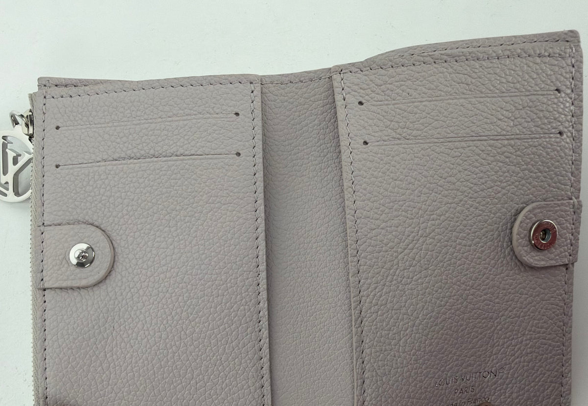 Louis Vuitton Lisa Wallet in Dust Pink Empreinte Leather NFC K-3