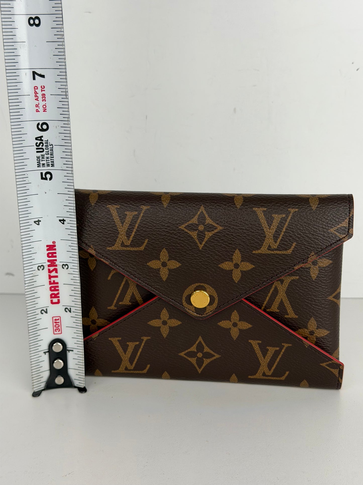 Louis Vuitton Medium Kirigami Pochette in LV Monogram Coated Canvas