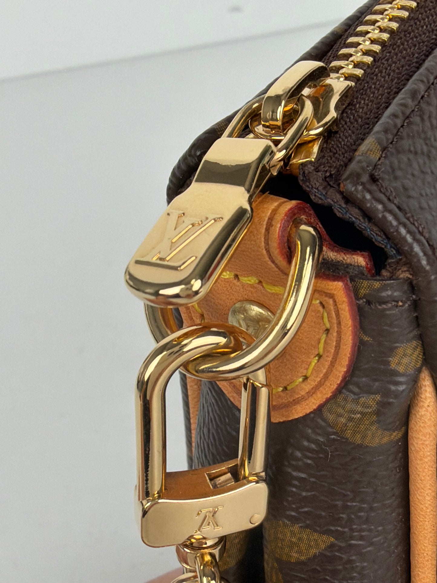 Louis Vuitton Eva Pochette in Brown LV Monogram Coated Canvas 2011 Y-E06