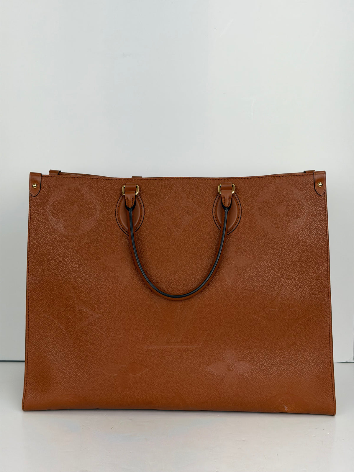 Louis Vuitton Onthego GM Tote Bag in Cognac Giant Monogram Empreinte Leather YC7