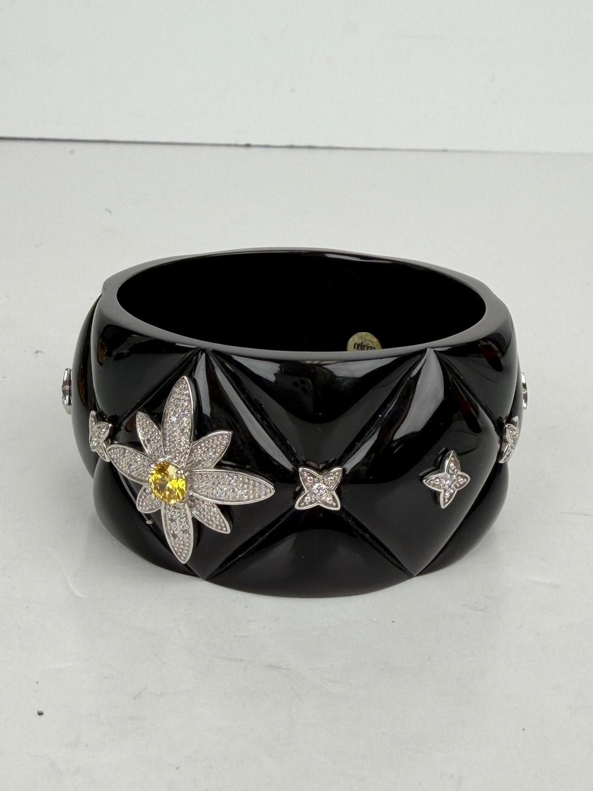 Mirim Bangle Bracelet in Black Quilted Resin & 925 Sterling Silver Flower Detail YK4