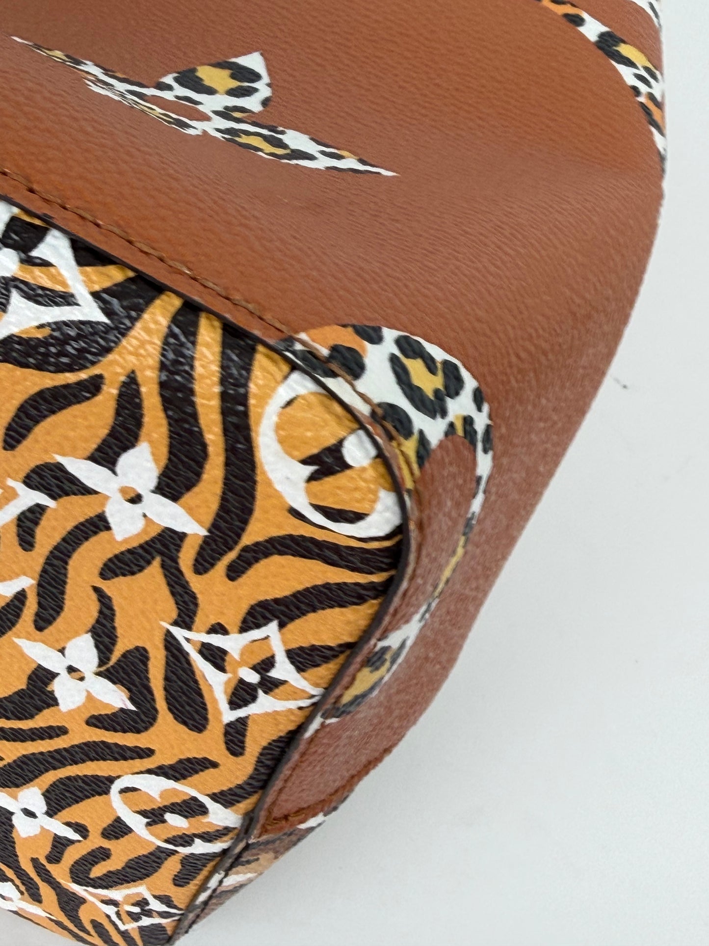 Louis Vuitton NeoNoe MM in the limited-edition Monogram Giant Jungle Print Coated Canvas NFC YC8