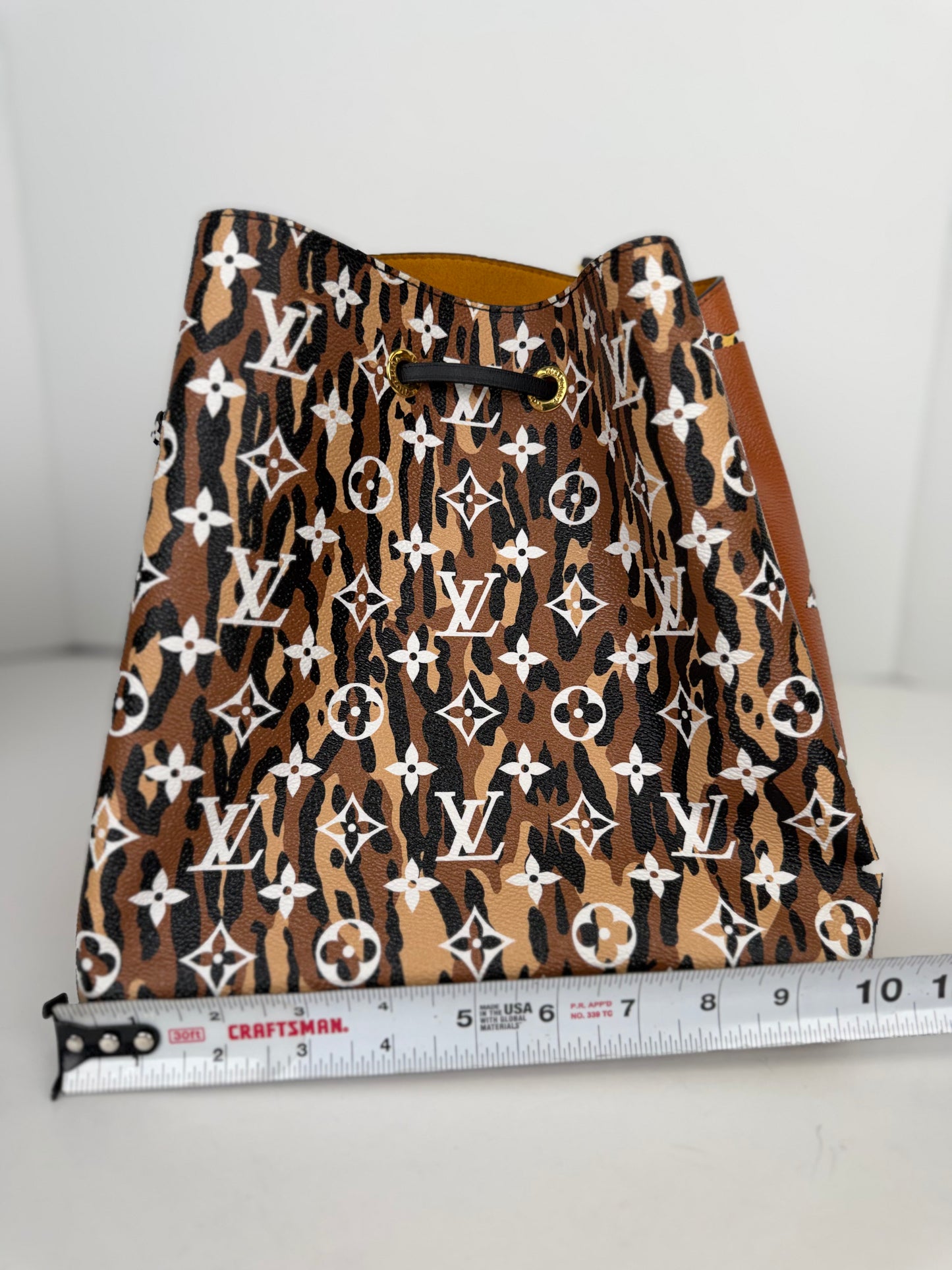 Louis Vuitton NeoNoe MM in the limited-edition Monogram Giant Jungle Print Coated Canvas NFC YC8