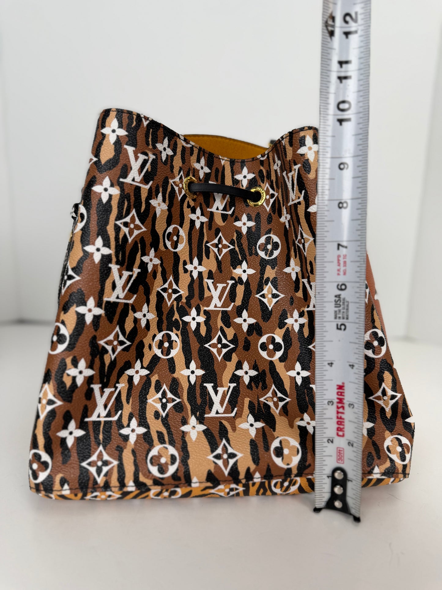 Louis Vuitton NeoNoe MM in the limited-edition Monogram Giant Jungle Print Coated Canvas NFC YC8