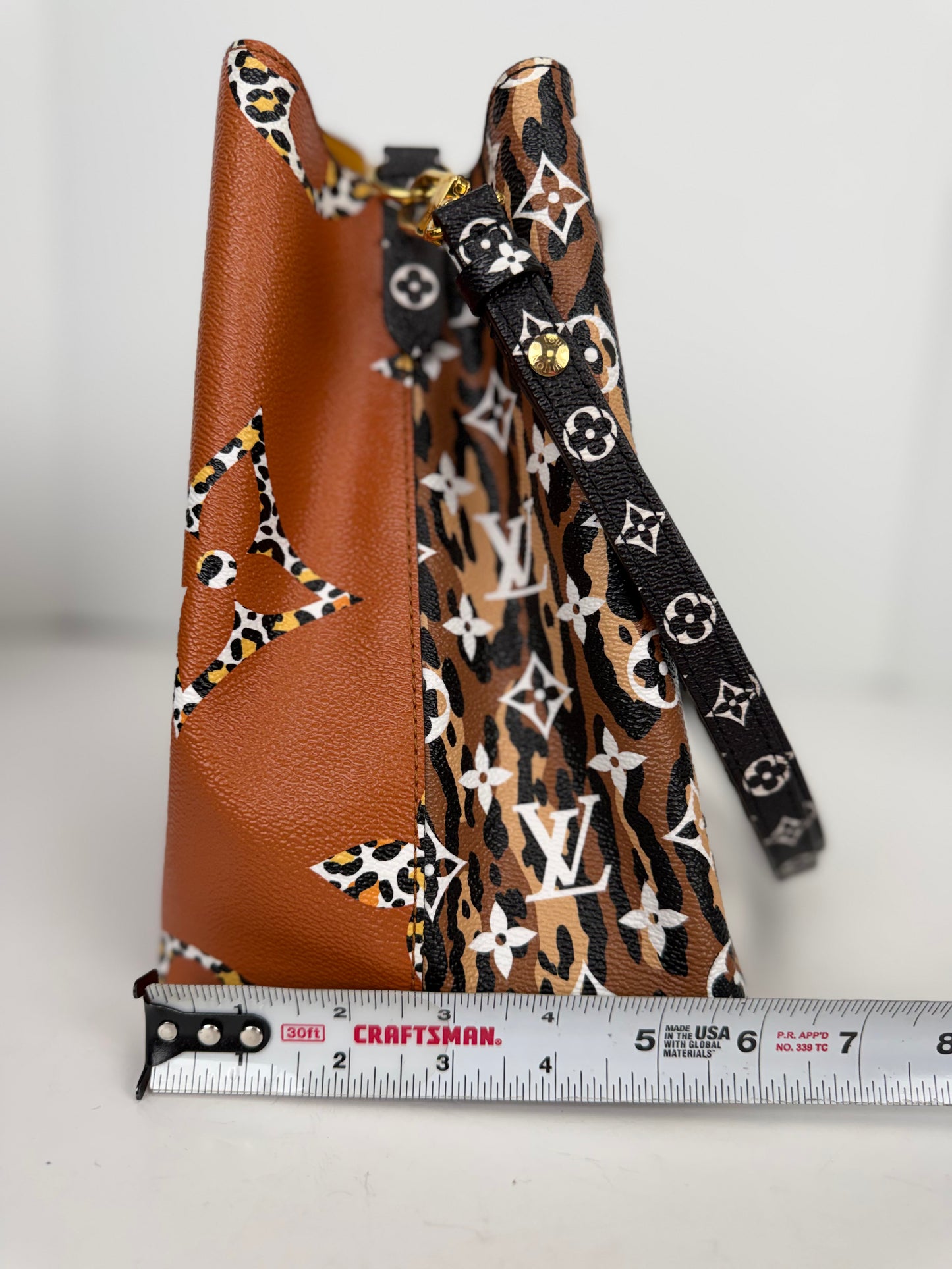 Louis Vuitton NeoNoe MM in the limited-edition Monogram Giant Jungle Print Coated Canvas NFC YC8