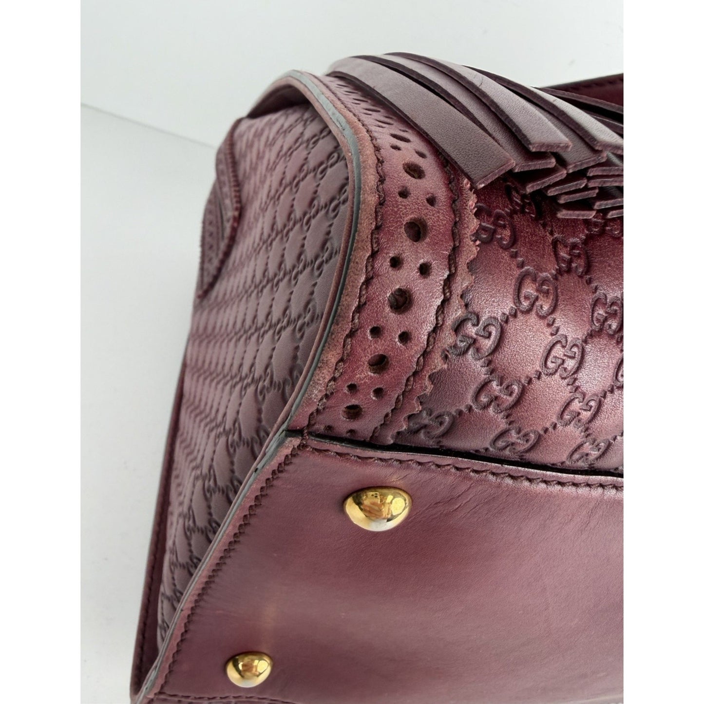 Gucci Duilio Brogue Boston Bag in Burgundy Microguccissima Embossed Leather S-16