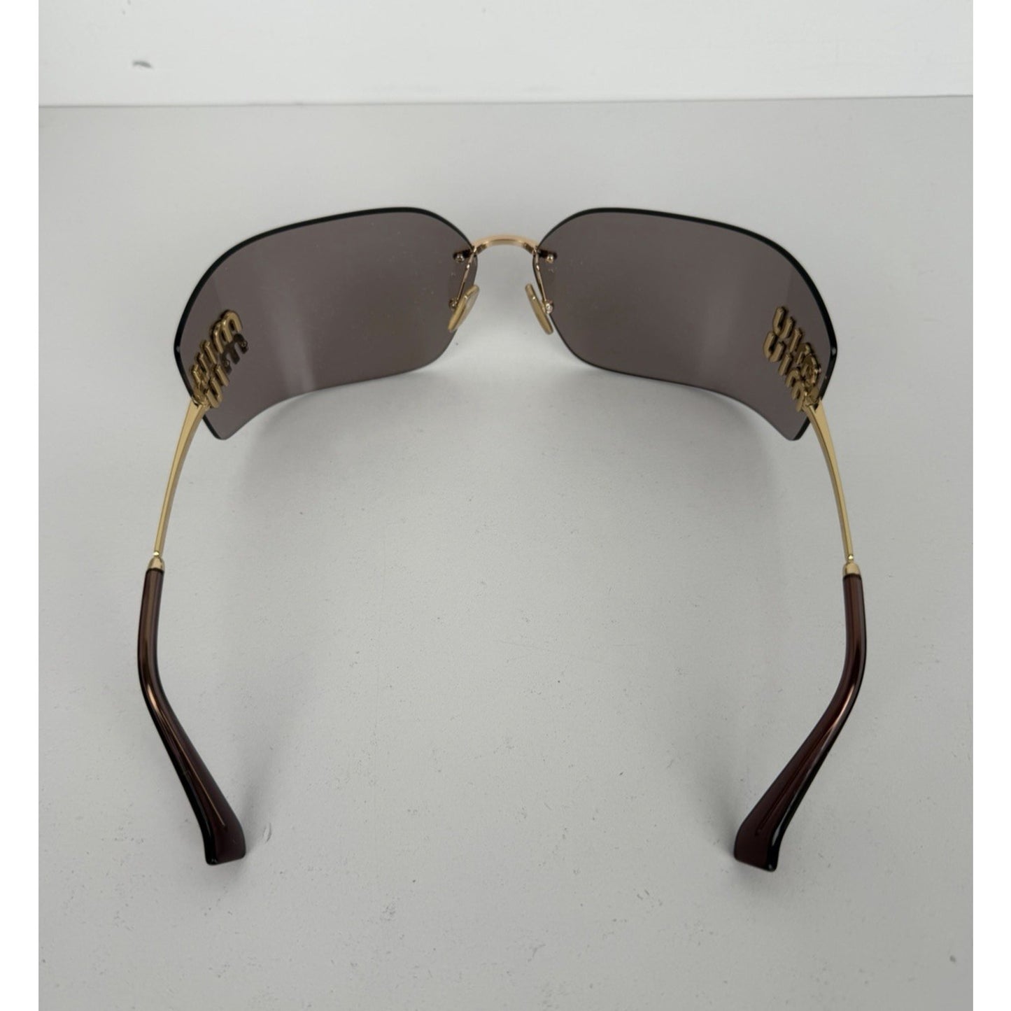 Miu Miu Aube MU 54YS Sunglasses in Gold-Tone Frame & Mauve Lenses S