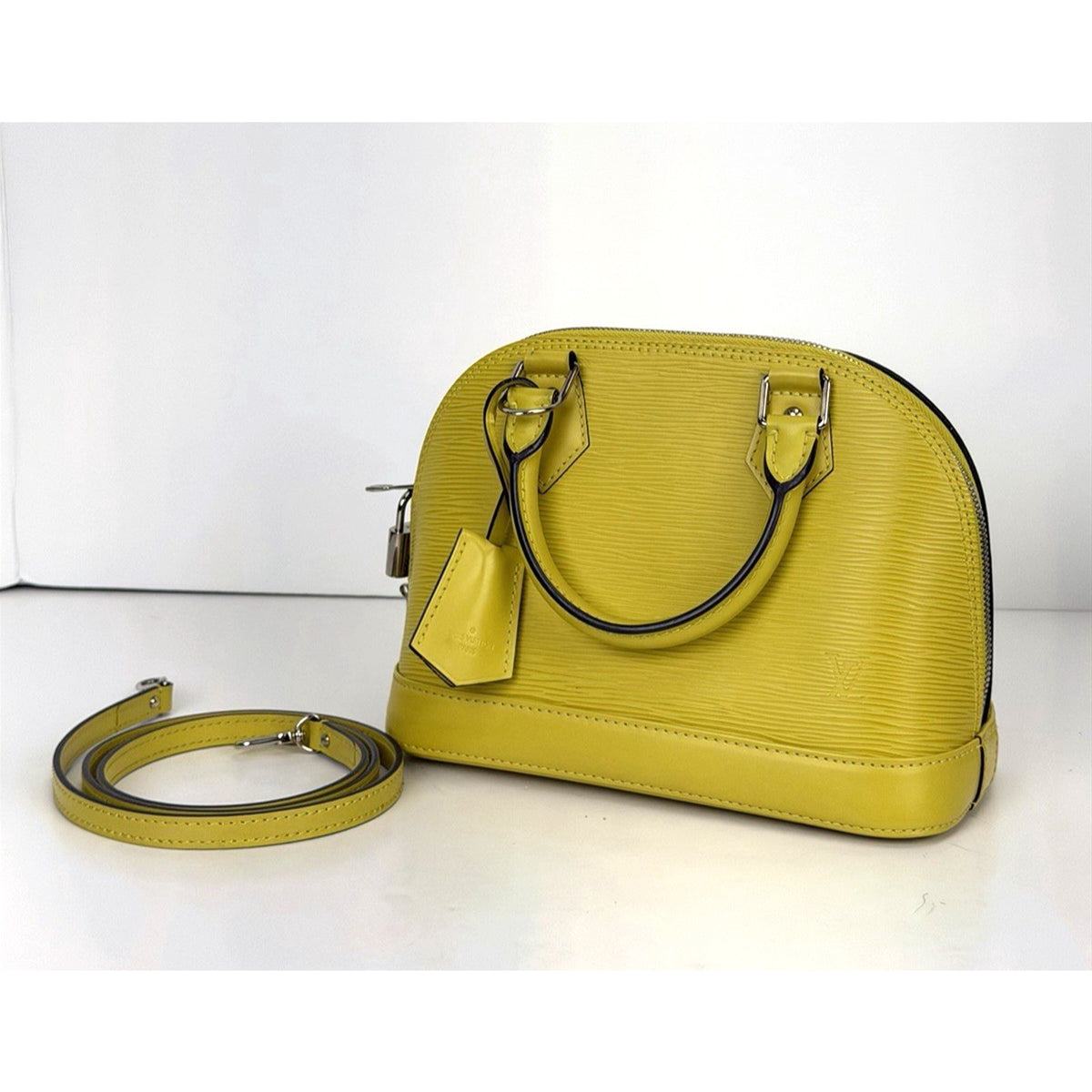 Louis Vuitton Alma BB Handbag in Yellow Epi Leather Silver-T Hardware 2014 S21