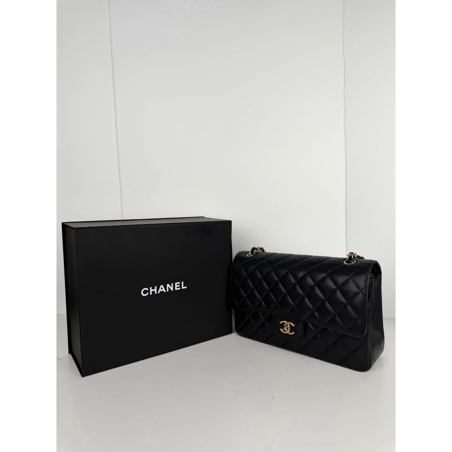 Chanel Classic Double Flap Shoulder Bag Jumbo in Black Caviar Leather 2025 dR-1