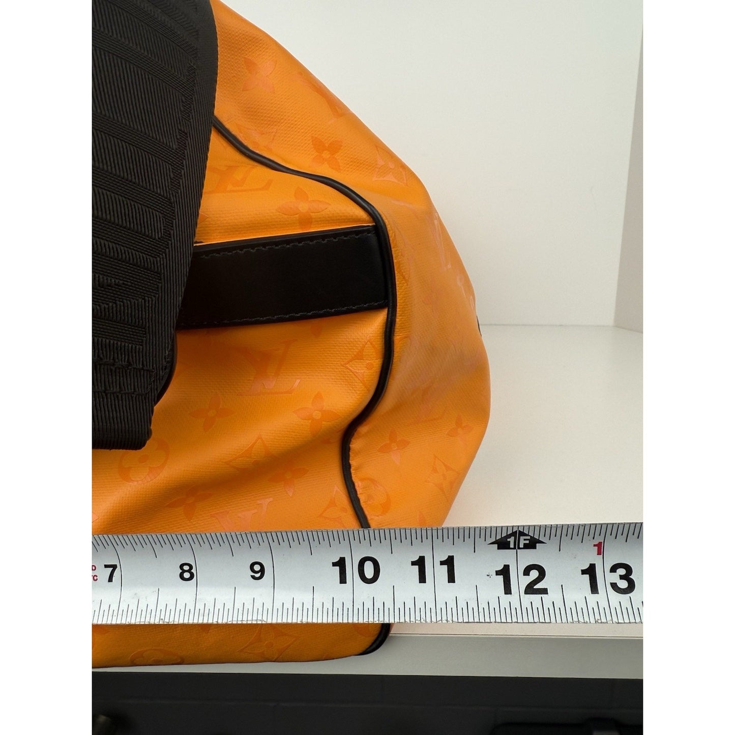 Louis Vuitton Ski Monogram Storm Coated Orange Canvas Keepall Sport