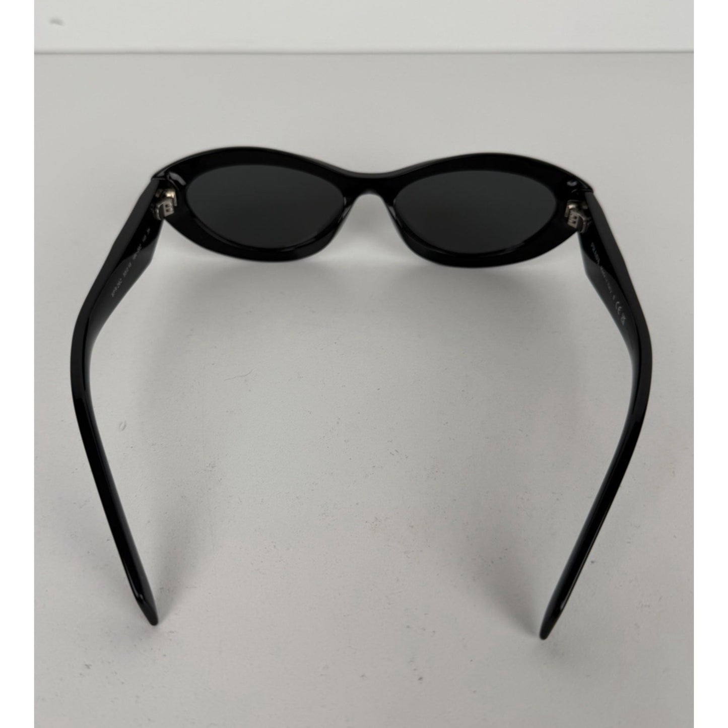Prada Symbole Oval Car-Eye Sunglasses 55 in Black with Dark Gray Lenses