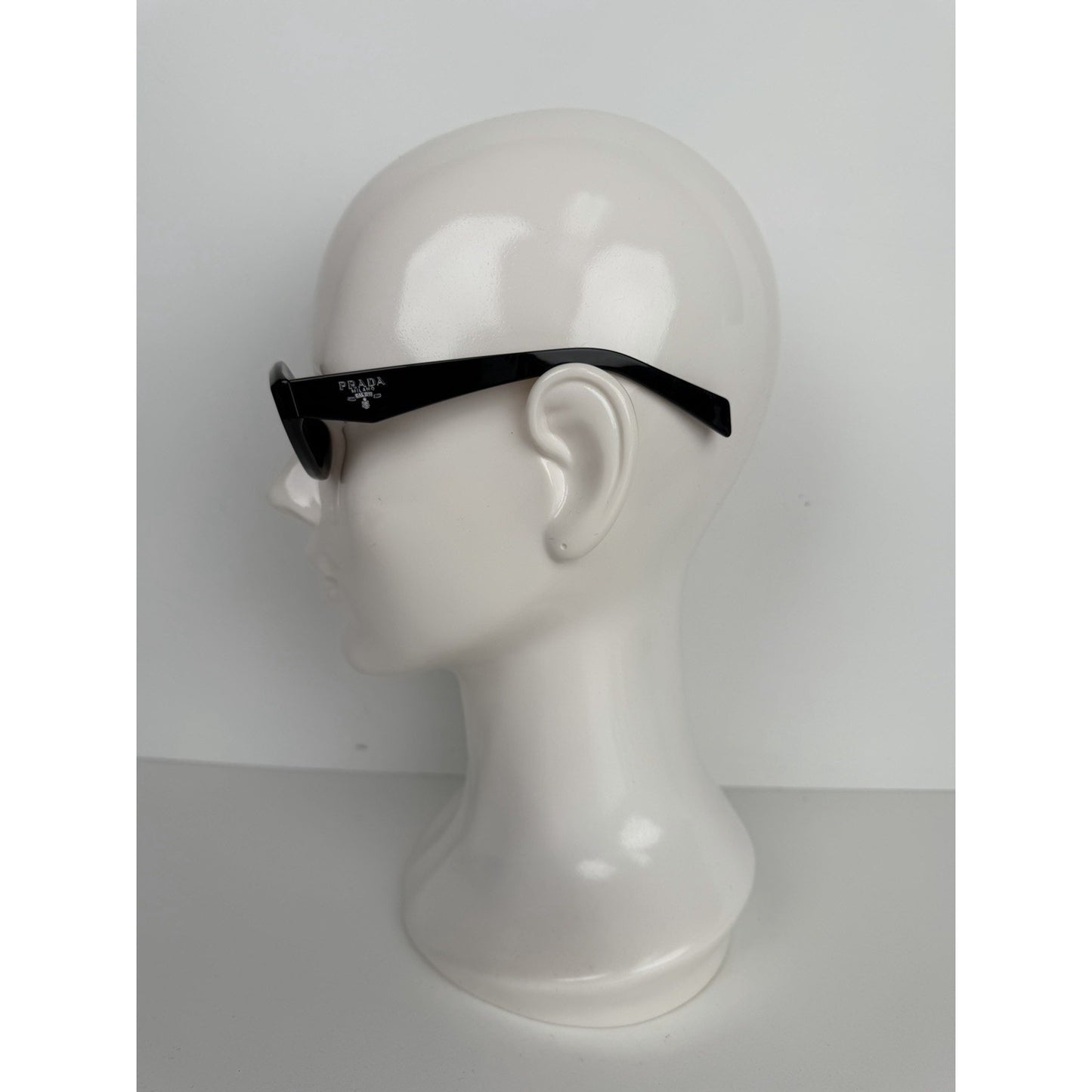 Prada Symbole Oval Car-Eye Sunglasses 55 in Black with Dark Gray Lenses