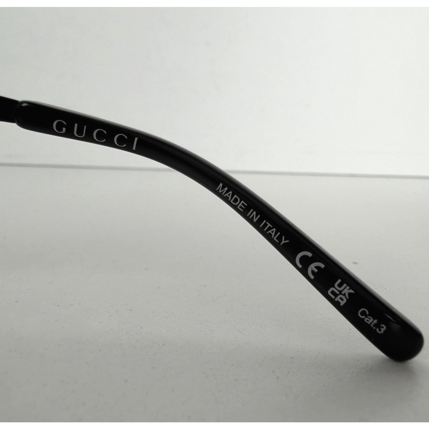 Gucci GG1656S 001 Sunglasses in Black Metal Frame and Grey Tinted Lenses