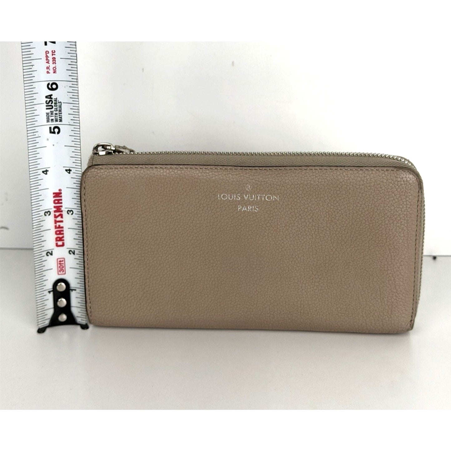 Louis Vuitton Comete Wallet in Galet (Beige) Taurillon Leather 2016
