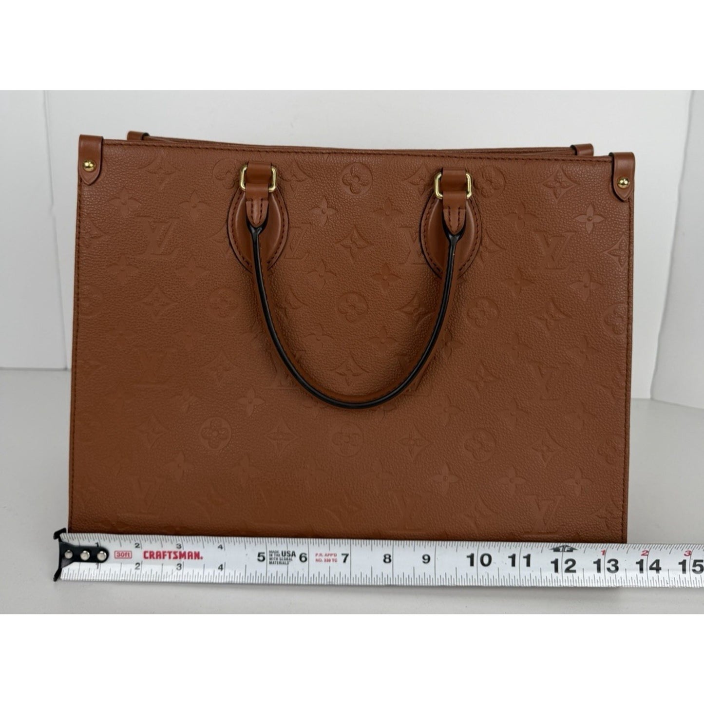 Louis Vuitton OnTheGo MM Tote Bag in Cognac Monogram Empreinte Leather D9