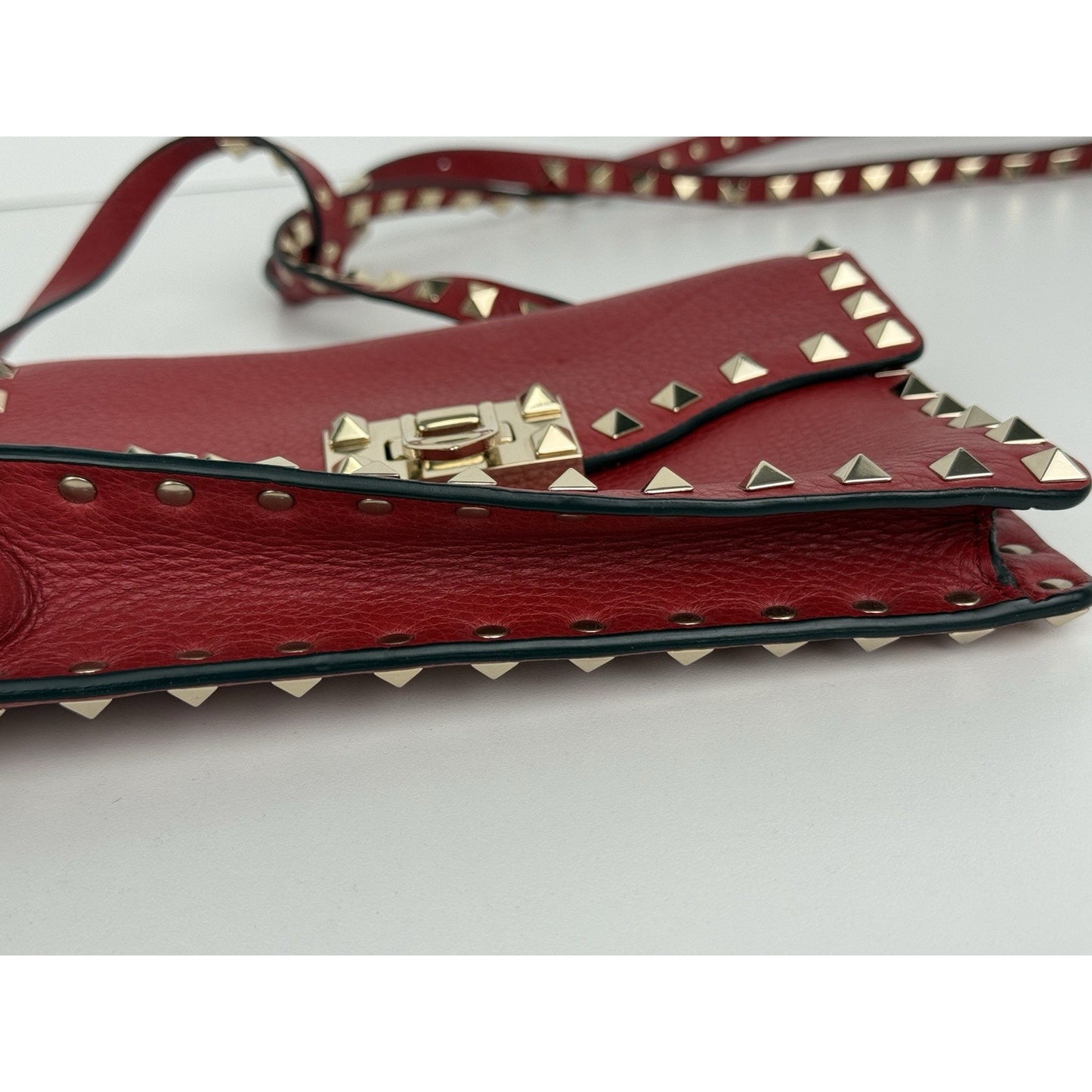VALENTINO GARAVANI Pebbled Calfskin Medium Rockstud Rouge