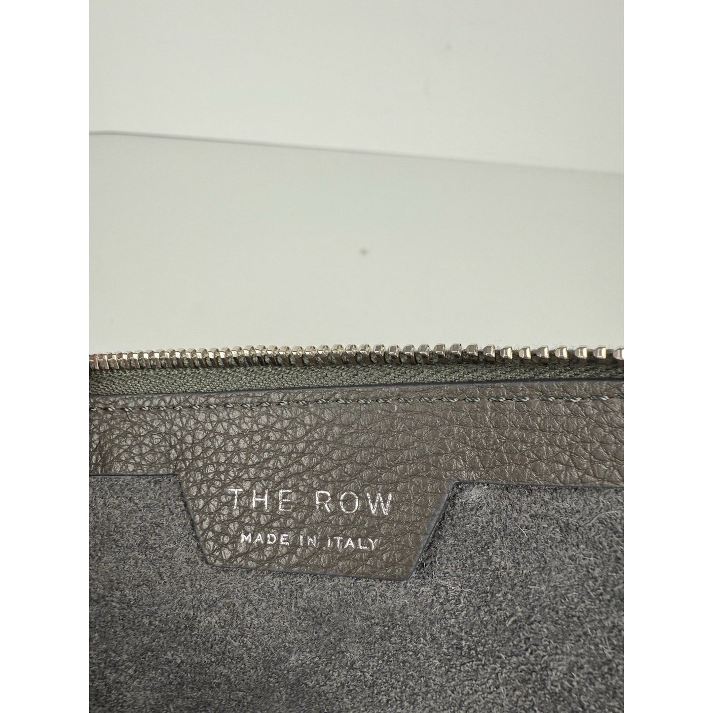 The Row Black Grained Leather Clutch